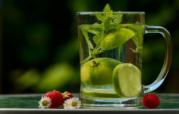 11 Best Employee Wellness Programs Examples A lemon infused drink